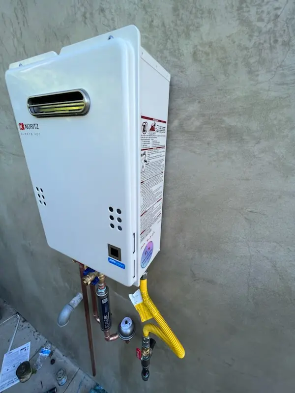 Tankless water heater installation for Andrews Manor homes